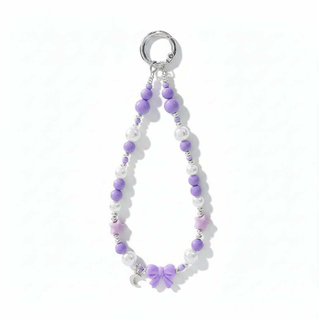 Purple beaded phone charm wristlet with bow charm and purple beads