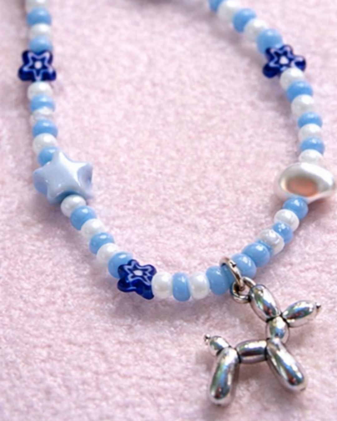 Chic & Secure: Sky Charm Beaded Phone Wristlet – Never Drop Your Phone in Style!