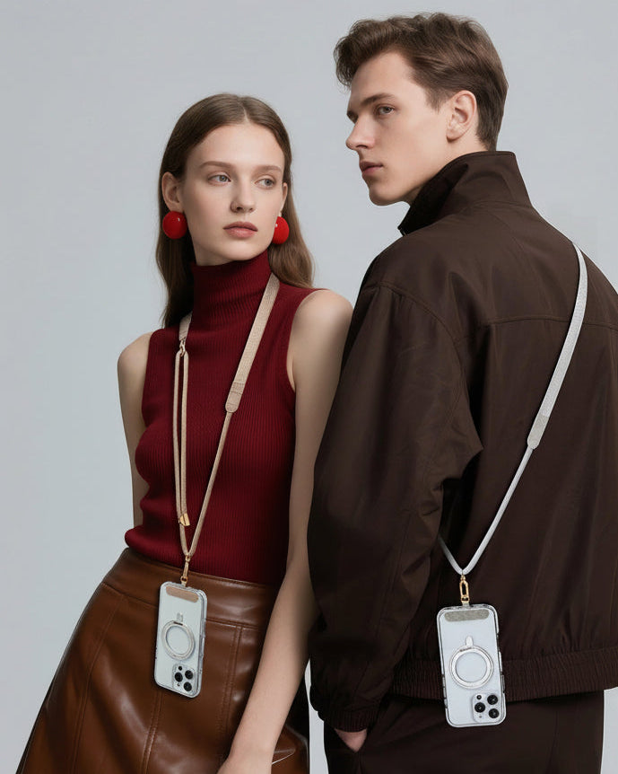 Two models wearing a phone case strap accessory. The left model wears a red turtleneck and brown skirt with a beige crossbody strap holding a white phone case.