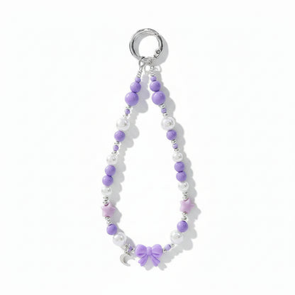 Purple beaded phone charm wristlet with bow charm and purple beads