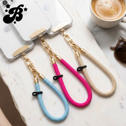 Luxe braided phone wristlet strap with matt silver attachments attached to smartphone, stylish hands-free anti-loss wrist strap accessory