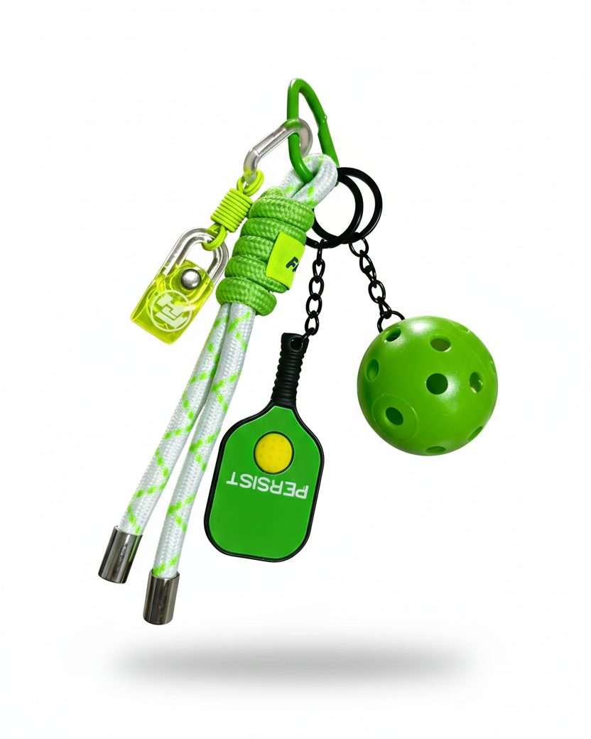 Clean product photo of green pickleball keychain on white background